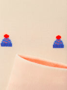 Weihnachtssocken Mütze in Papyrus White – Detail mit Innenbund